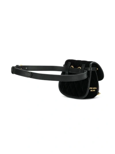 Shop Prada Small Quilted Eyelet Saddle Bag In Black