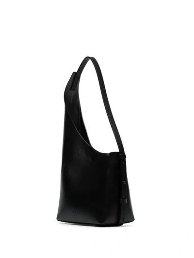 Shop Aesther Ekme Demi Lune Asymmetric Bucket Bag In Black