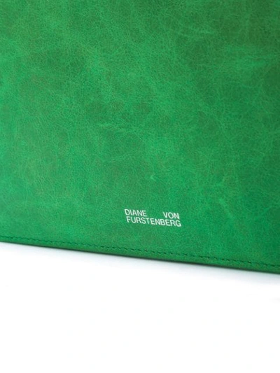 Shop Diane Von Furstenberg Large Flap Pouch In Green