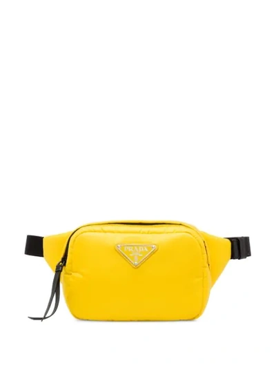 Shop Prada Padded Belt Bag In Yellow