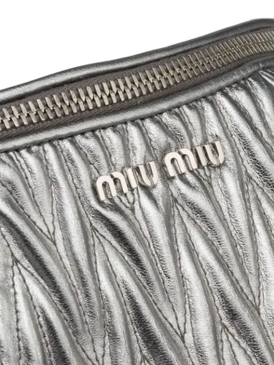 Shop Miu Miu Matelassé Belt Bag In Metallic