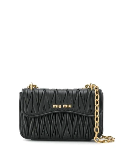 Shop Miu Miu Matelassé Shoulder Bag In Black