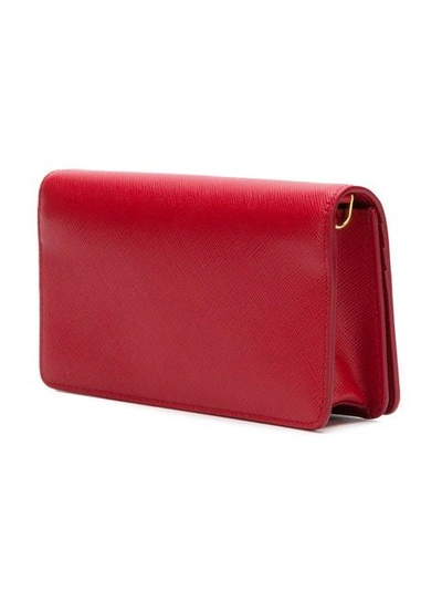 Shop Prada Mini Saffiano Chain Wallet In Red