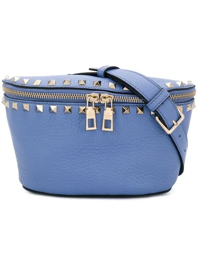 Shop Valentino Rockstud Belt Bag In Blue