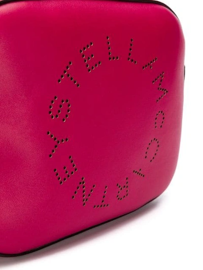 Shop Stella Mccartney Perforated Logo Crossbody Bag - Pink