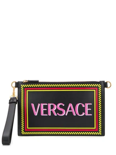 Shop Versace Logo Print Clutch Bag In Black