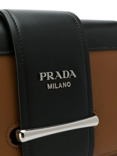 Shop Prada Schultertasche Mit Logo In Brown