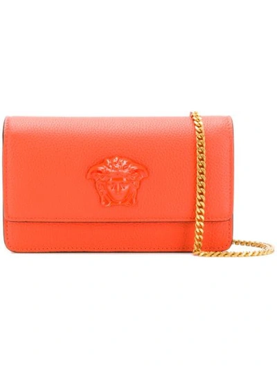 Shop Versace Medusa Head Clutch Bag In Orange