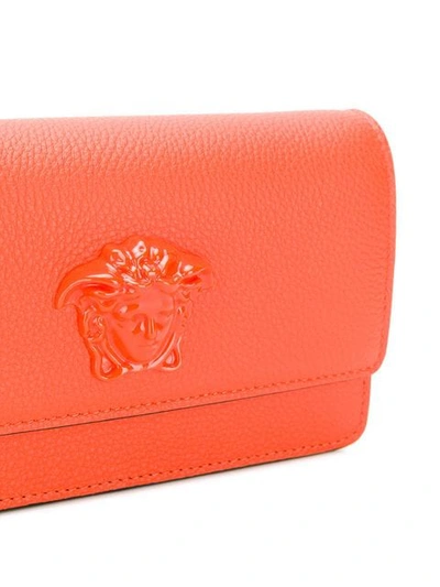 Shop Versace Medusa Head Clutch Bag In Orange