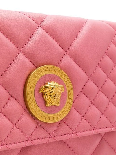 Shop Versace Quilted Clutch In Pink