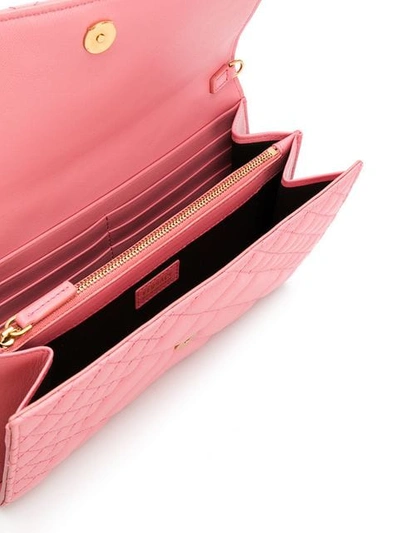 Shop Versace Quilted Clutch In Pink
