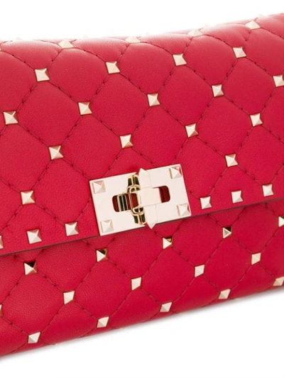 Shop Valentino Rockstud Spike Shoulder Bag In Red