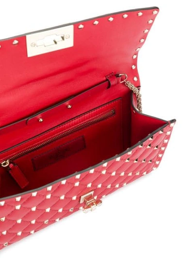 Shop Valentino Rockstud Spike Shoulder Bag In Red