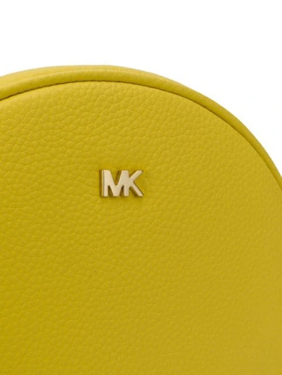 Shop Michael Michael Kors Round Crossbody Bag - Yellow
