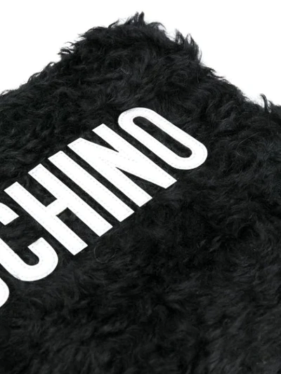 Shop Moschino Medium Textured Logo Pouch - Black