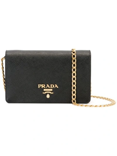 Shop Prada Logo Plaque Clutch In Black