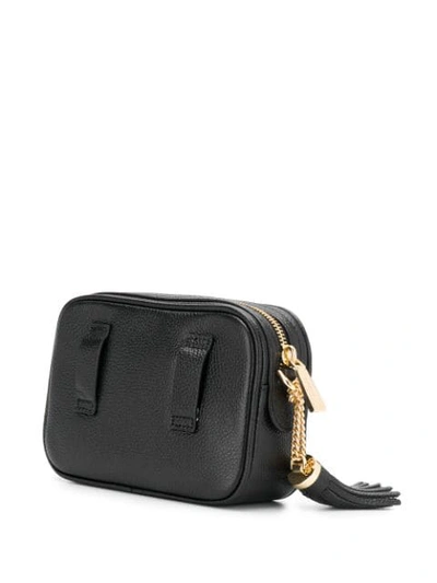 Shop Michael Michael Kors Tassel Belt Bag - Black