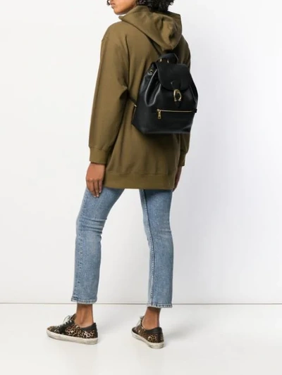 Shop Coach Evie Backpack In Brown