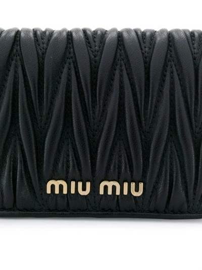 Shop Miu Miu Mini Matelassé Belt Bag - Black