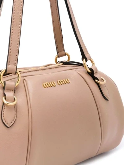 Shop Miu Miu Oval Shoulder Bag In Neutrals