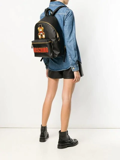 Shop Moschino Logo Patch Backpack In Black
