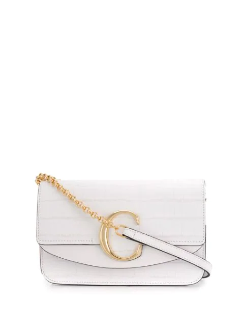 white chain clutch bag