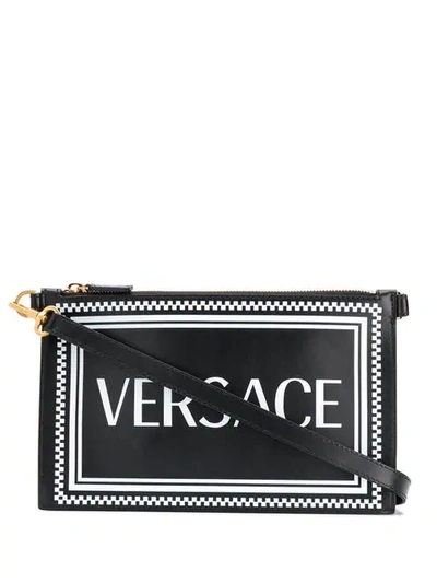 Shop Versace 90's Vintage Logo Clutch Bag In Black