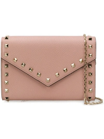 Shop Valentino Garavani Rockstud Cross Body Bag In Pink