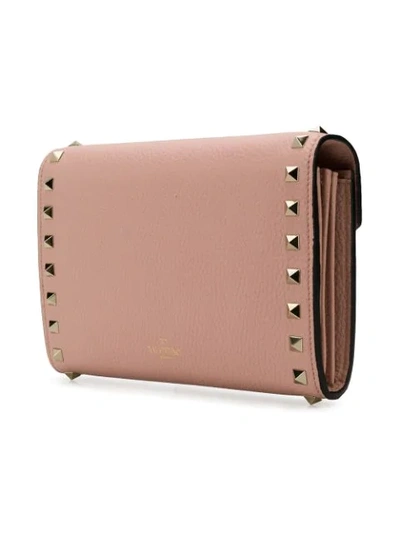 Shop Valentino Garavani Rockstud Cross Body Bag In Pink