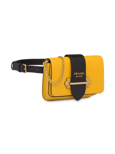 Shop Prada Cahier Belt Bag In Yellow