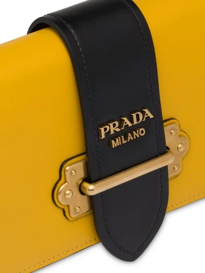 Shop Prada Cahier Belt Bag In Yellow