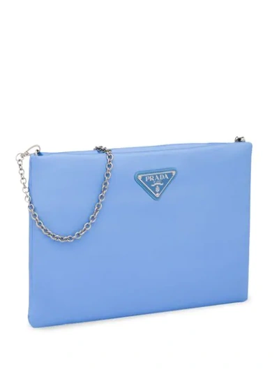 Shop Prada Padded Clutch Bag In Blue