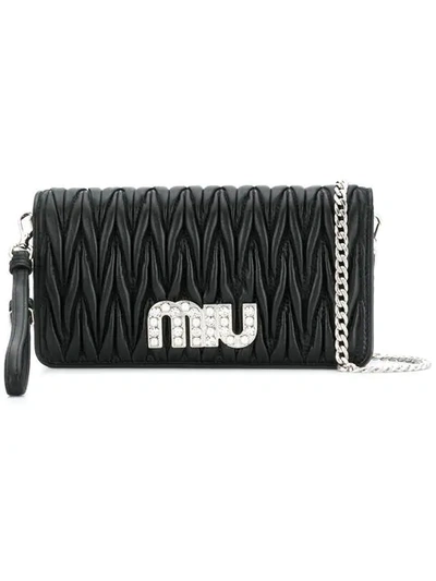 Shop Miu Miu Matelassé Clutch Bag In Black