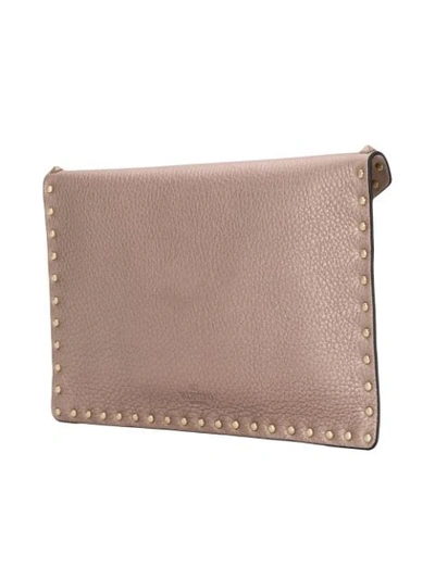 Shop Valentino Garavani Rockstud Large Flat Pouch - Neutrals