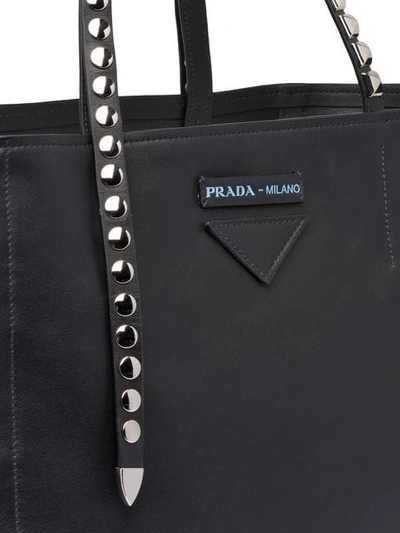 Shop Prada Studded Logo Tote In Black