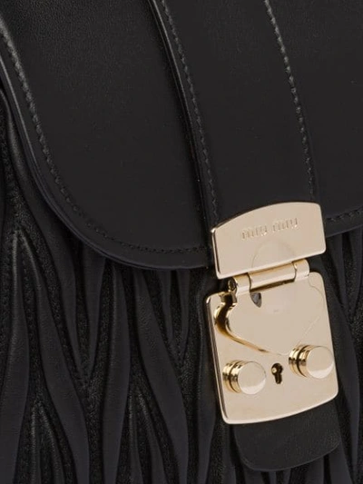 Shop Miu Miu Matelassé Backpack In Black