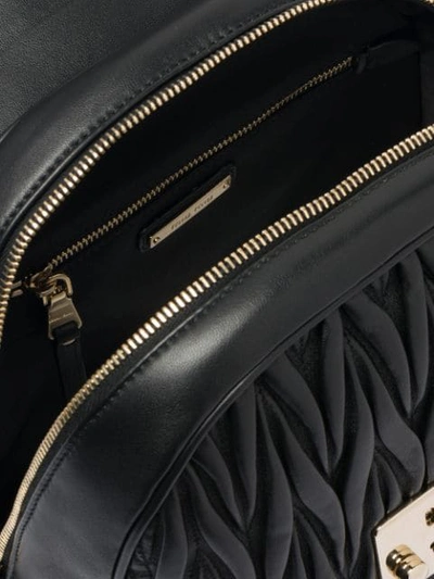 Shop Miu Miu Matelassé Backpack In Black