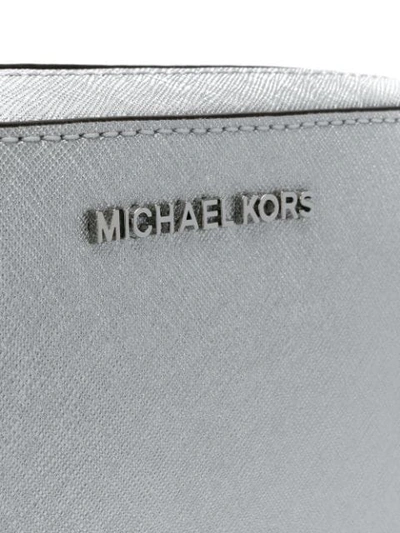 Shop Michael Michael Kors Jet Set Cross Body Clutch - Metallic