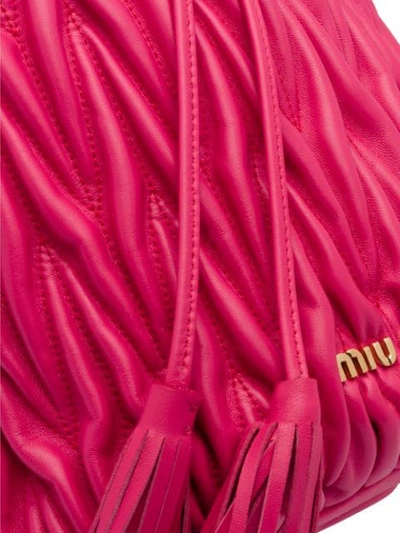 Shop Miu Miu Matelassé Drawstring Bucket Bag In Pink