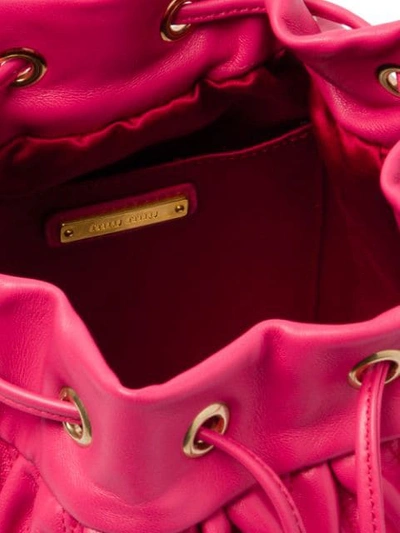 Shop Miu Miu Matelassé Drawstring Bucket Bag In Pink