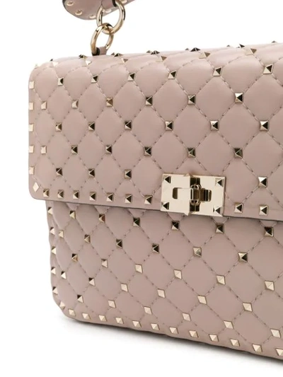 Shop Valentino Rockstud Spike Handbag In Neutrals