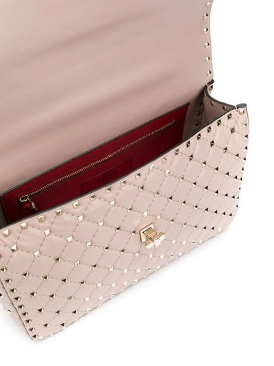 Shop Valentino Rockstud Spike Handbag In Neutrals