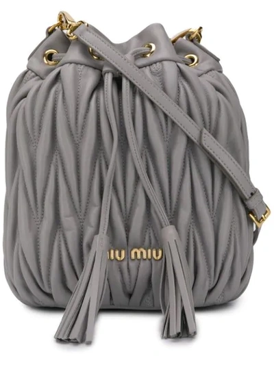 Shop Miu Miu Matelassé Bucket Bag In Grey