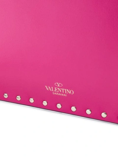Shop Valentino Garavani Rockstud Envelope Clutch - Pink