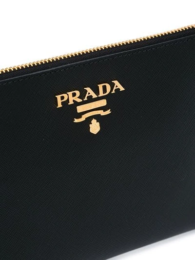 Shop Prada Logo Plaque Clutch Bag In F0002 Nero