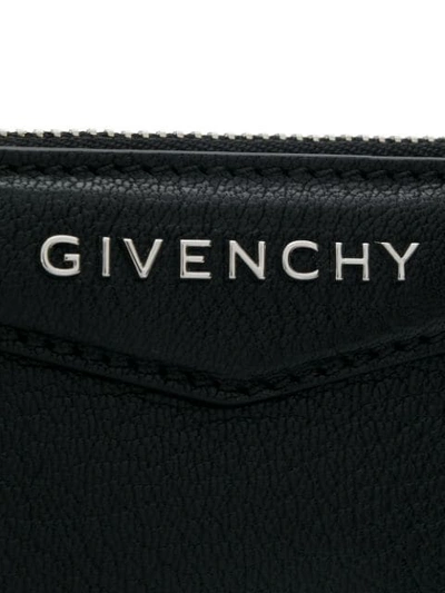 Shop Givenchy Logo Plaque Clutch Bag In Black