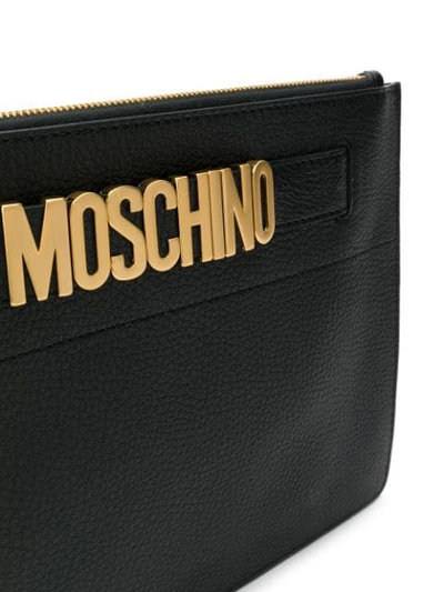 Shop Moschino Logo Plaque Clutch In Black
