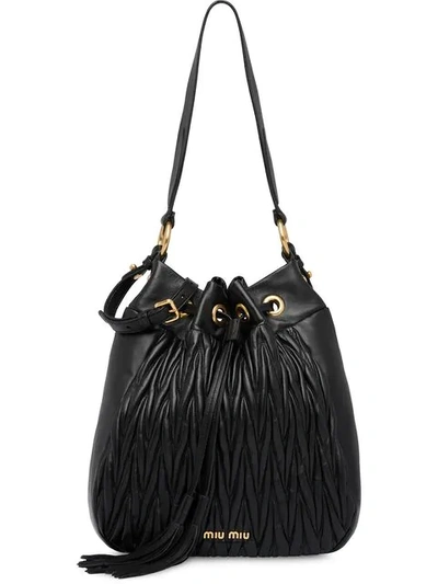 Shop Miu Miu Matelassé Leather Bucket Bag In F0002 Black