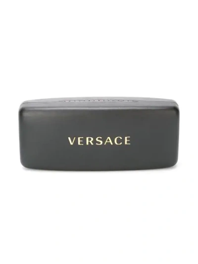 Shop Versace Embellished Sunglasses In Black