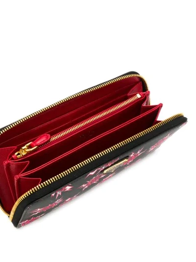 Shop Prada Floral Zipped Wallet In Black